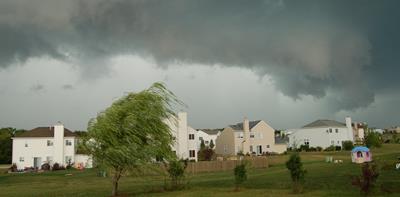 Houses with stormy clouds