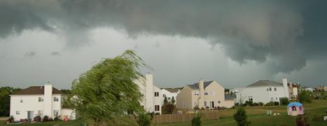Houses with stormy clouds