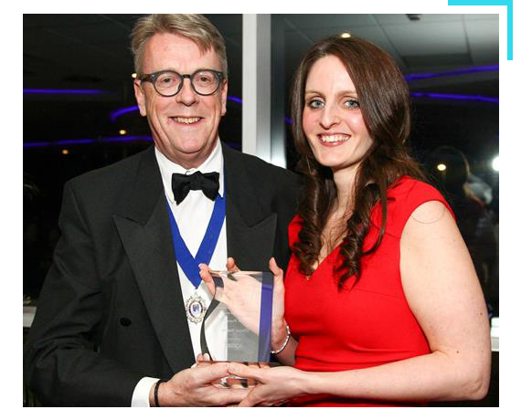 Receiving award at ceremony
