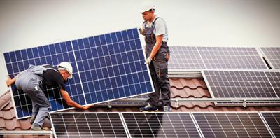 installing solar panels on a roof