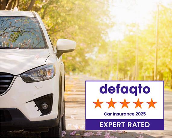 White car in forest with defaqto logo 2025