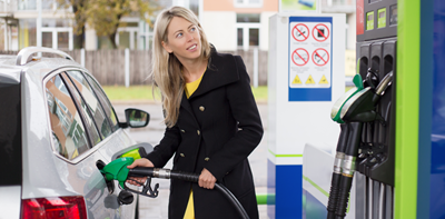 woman petrol pump filling car