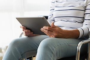 person holding iPad