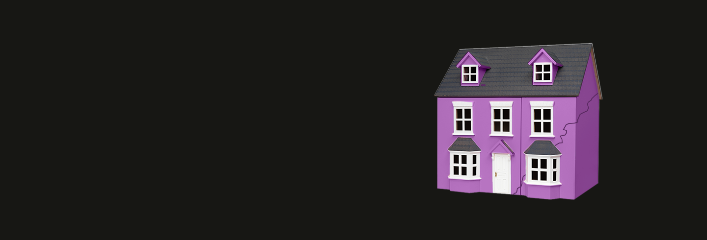 Purple house with large crack on black background