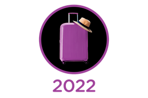 Purple suitcase cut out with sun hat - on black background