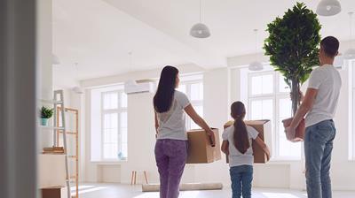 A family move contents into their home