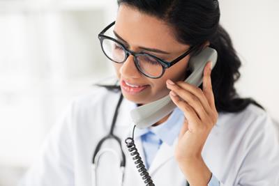 Female vet on the phone