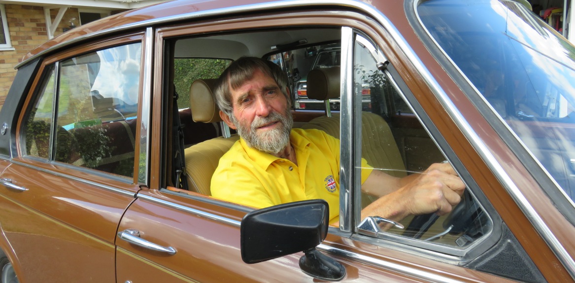 Richard sat in his repaired classic car