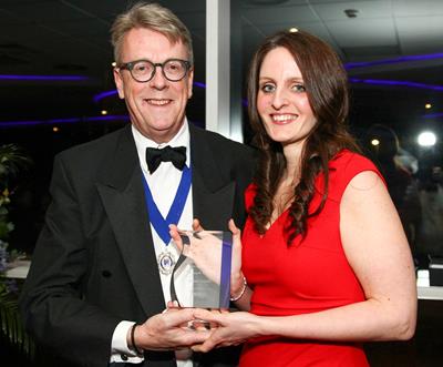 Claire Smith receiving CII award plaque