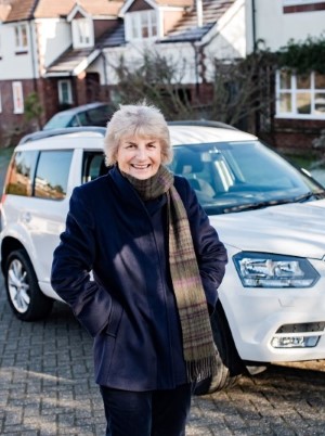 Sue sheldon with her repaired car