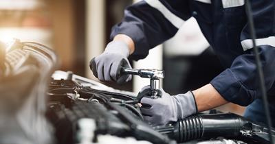 mechanic working on a car