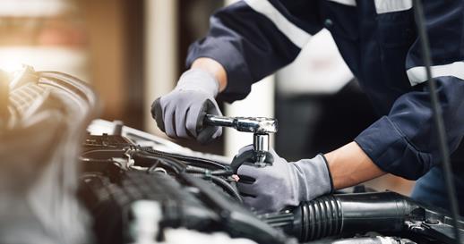 mechanic working on a car