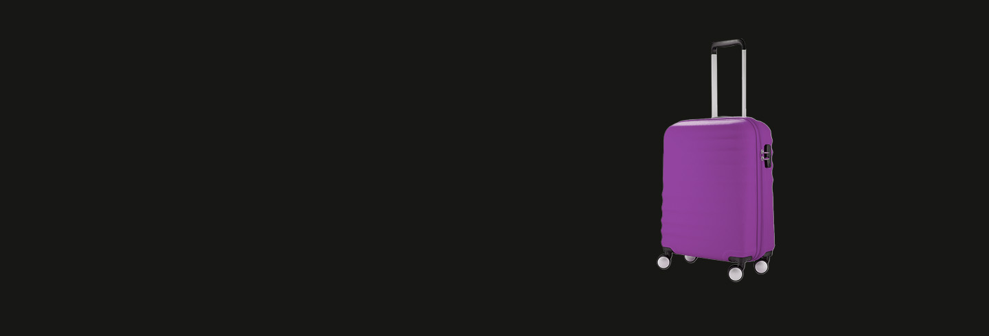 Single purple suitcase on a black background