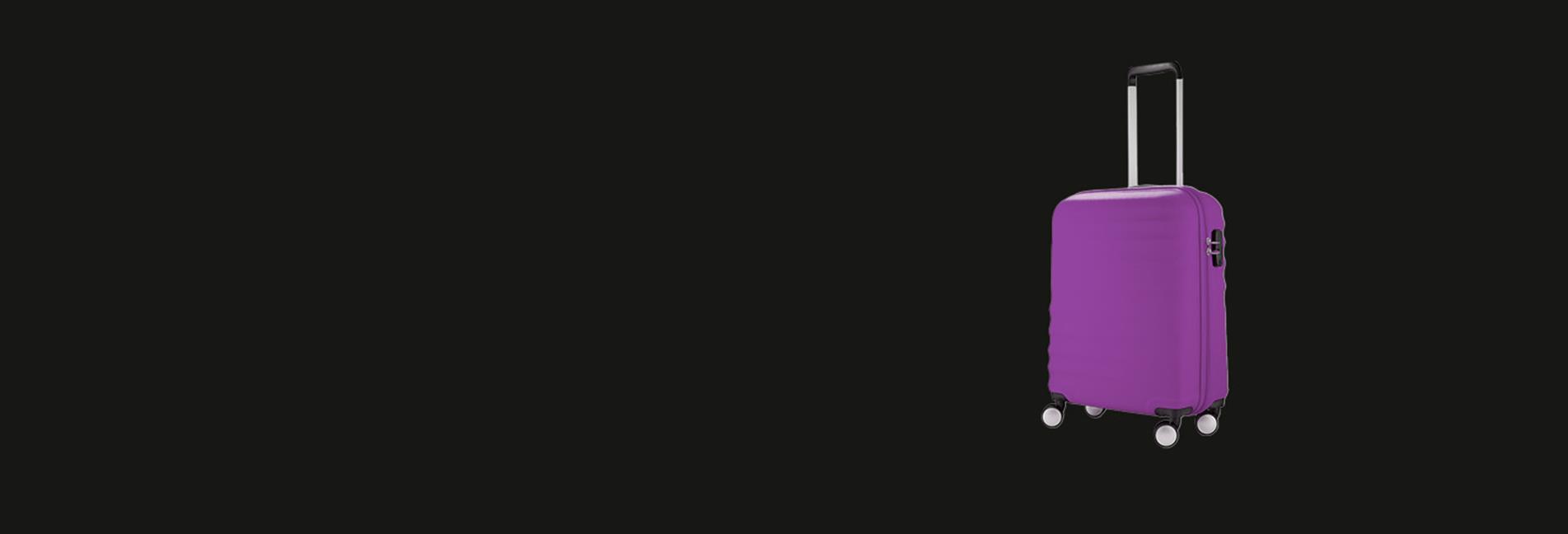 Single purple suitcase on a black background