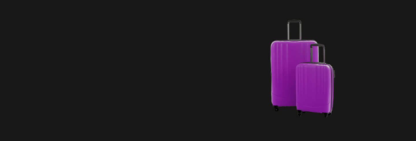 Two purple suitcases on black background