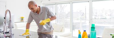 Man cleaning kitchen