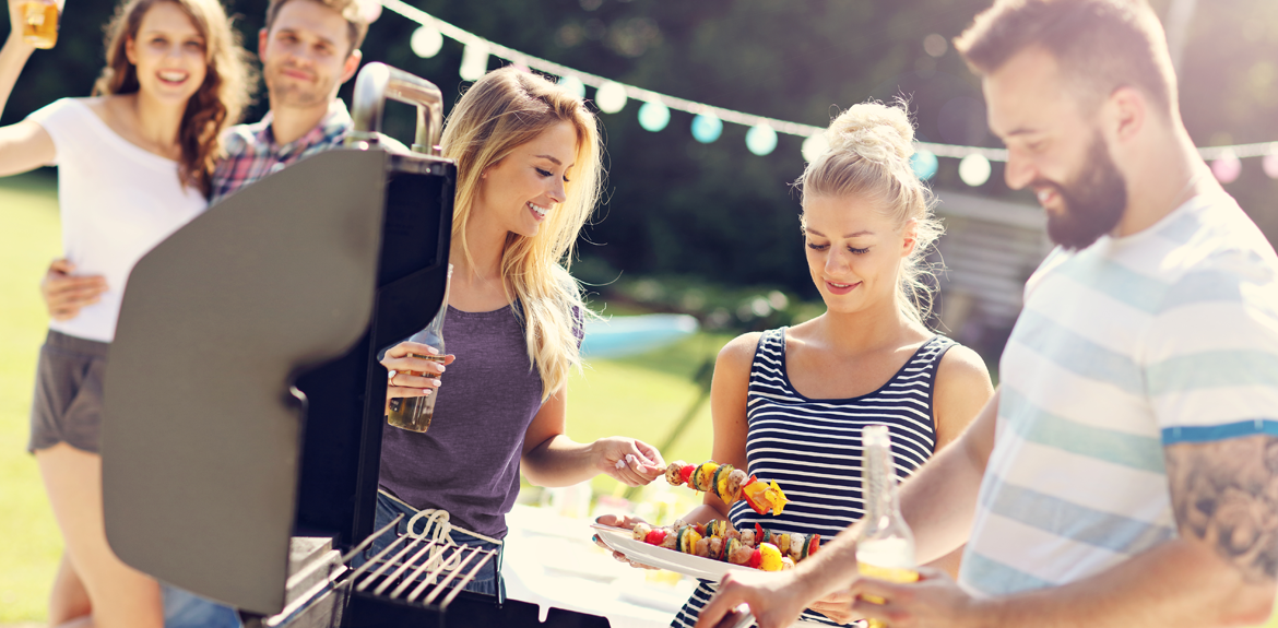 group of friends having fun at summer bbq