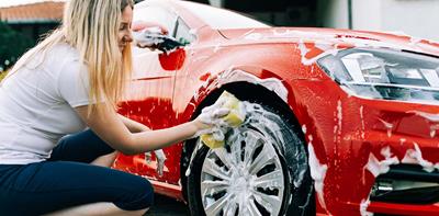 woman washing car