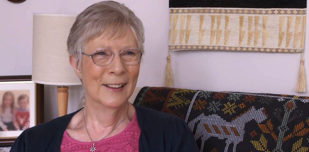 customer Margaret sat in living room