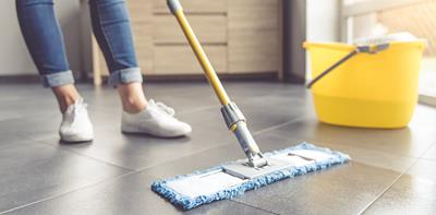 woman mopping floor