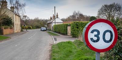 30 speed sign road village