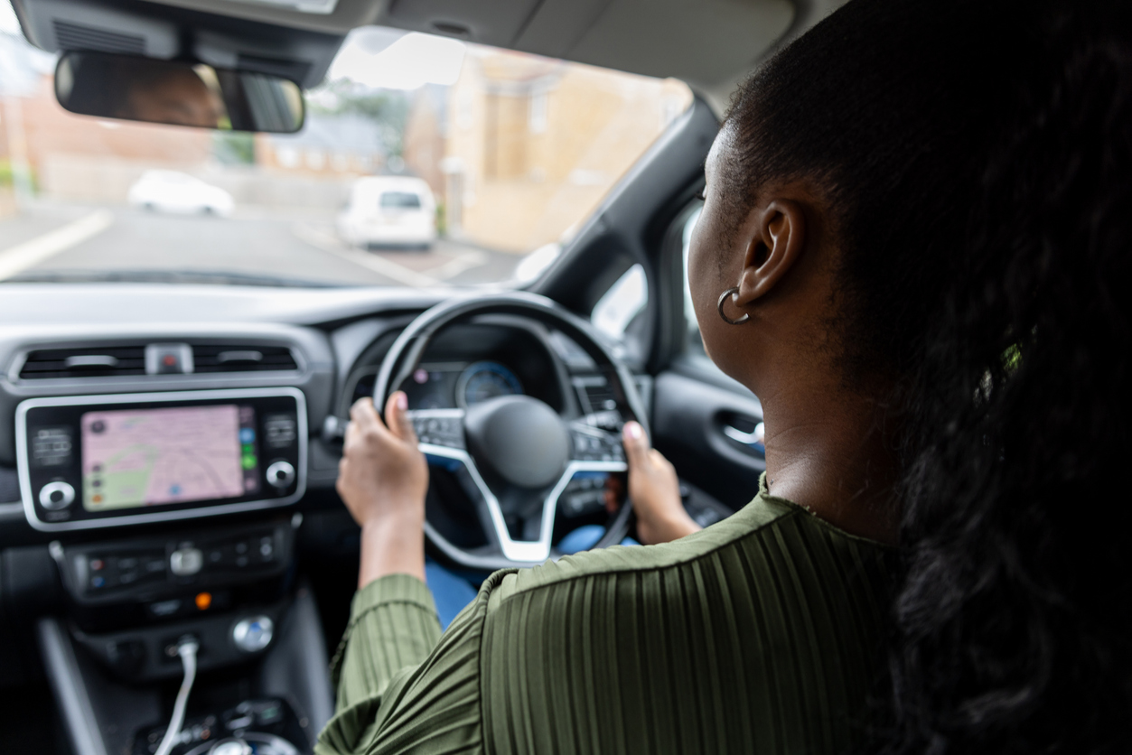 woman driving an electric car