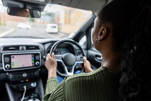 woman driving an electric car